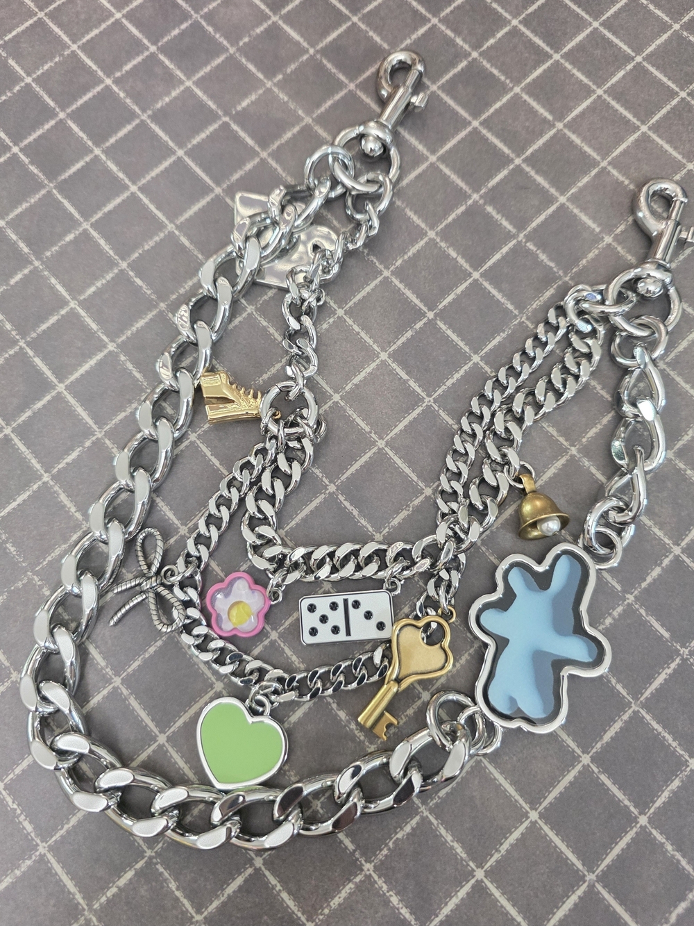 Marc Jacobs sticker shoulder strap.